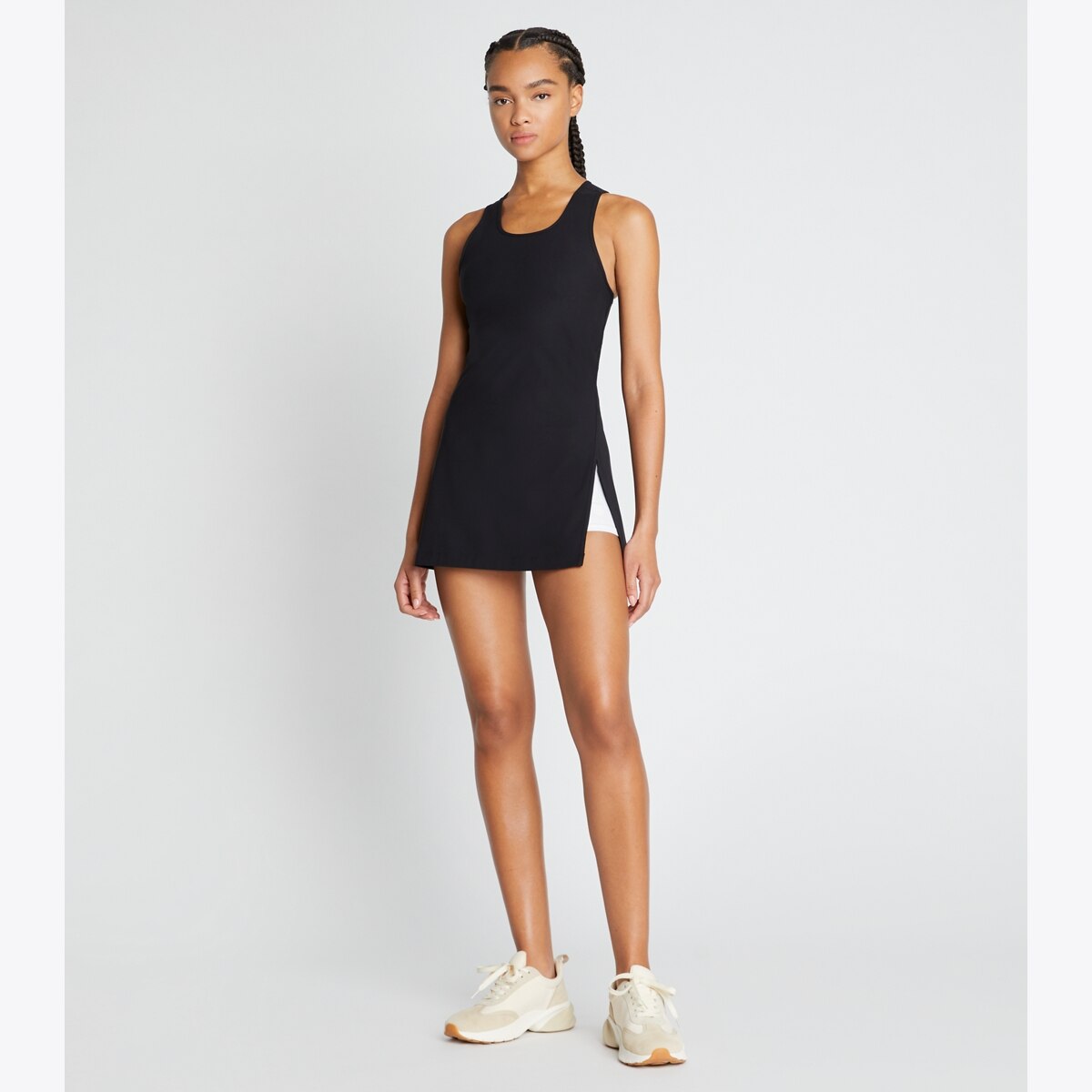 performance-jersey-side-slit-tennis-dress-on-model-front.TB_149262_009_20230221_OMFRO.pdp-1200x1200-1